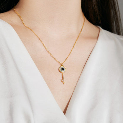 Delicate Key Charm with Sparkling Evil Eye Details

