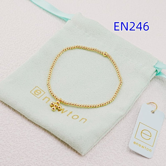 Elastic beaded cross pendant bracelet in gold color, beaded chain charm