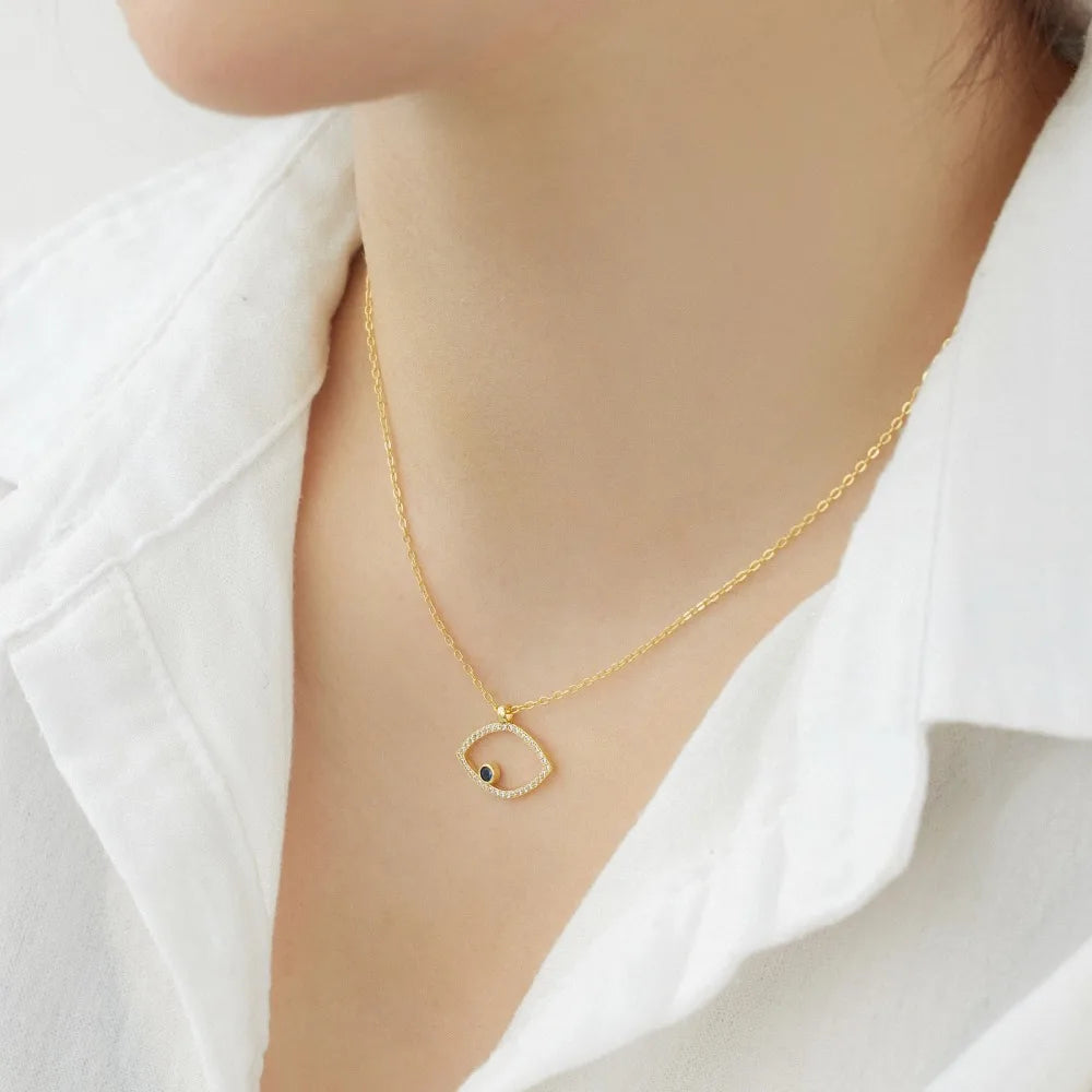 minimalist evil eye pendant