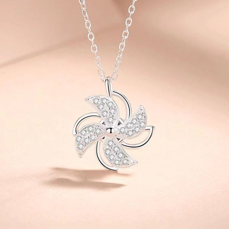 rotating windmill necklace silver