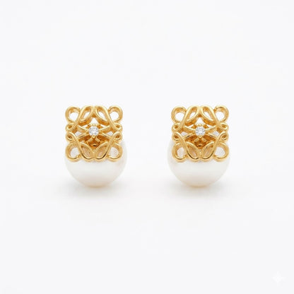 Gold-tone filigree square pearl stud earrings with clear crystal centers
