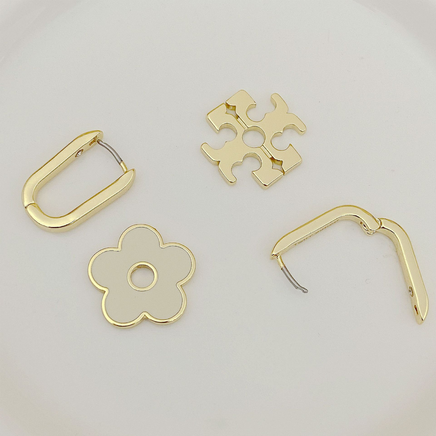 Tory Burch Elegant Floral Logo U-Shaped Metal Earrings