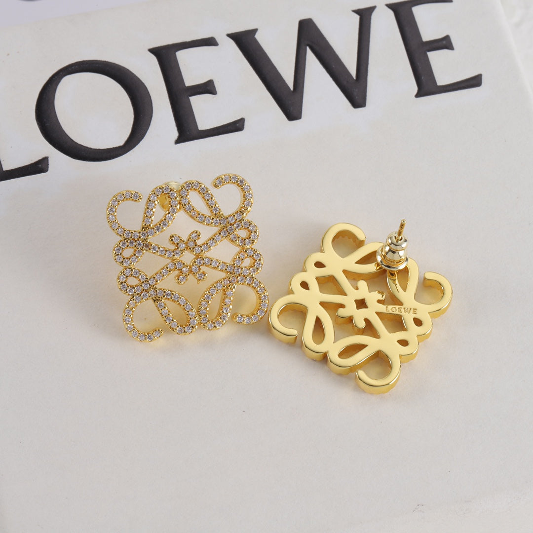 LOEWE square stud earrings with hollow logo, one gold pavé and one smooth gold logo.