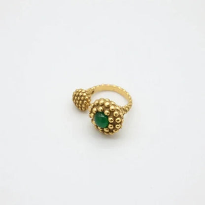 Green cabochon gold-tone ring with round bubble bezel and ridged band