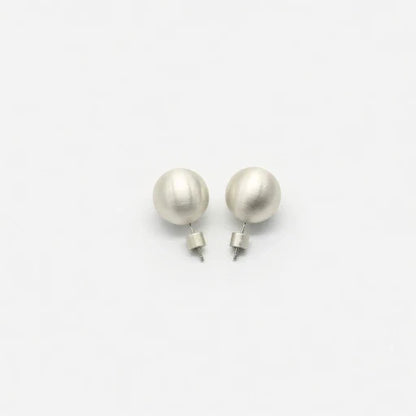 Silver ball stud earrings with smooth round fronts and push-back posts
