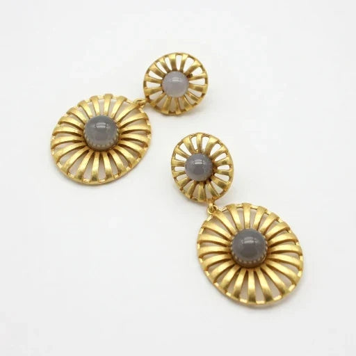 Gold-tone sunburst drop earrings with light gray cabochon discs and small top studs