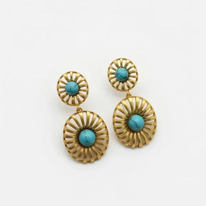 Gold-tone sunburst drop earrings with turquoise cabochon discs and small top studs