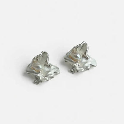 Pair of silver-tone freshwater pearl stud earrings with irregular sculpted shape