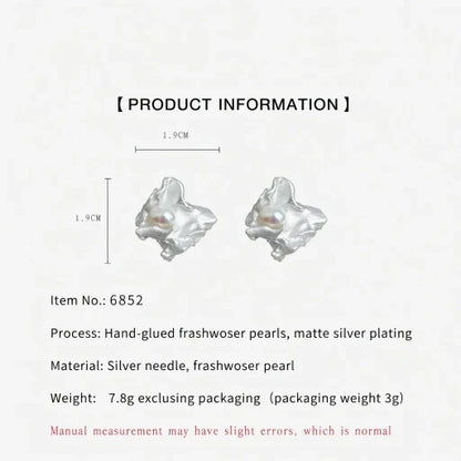 Irregular freshwater pearl stud earrings with matte silver finish, pair shown