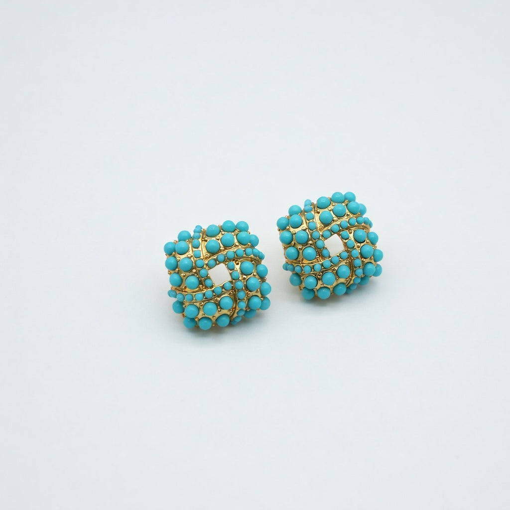 Pair of turquoise beaded stud earrings with gold-tone woven lattice center