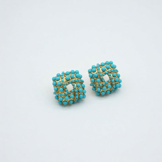 Pair of turquoise beaded stud earrings with gold-tone woven lattice center