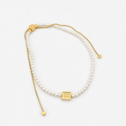 Miu Miu Adjustable Drawstring Elegant Tag Pearl Necklace | JIMMY JEWELRY