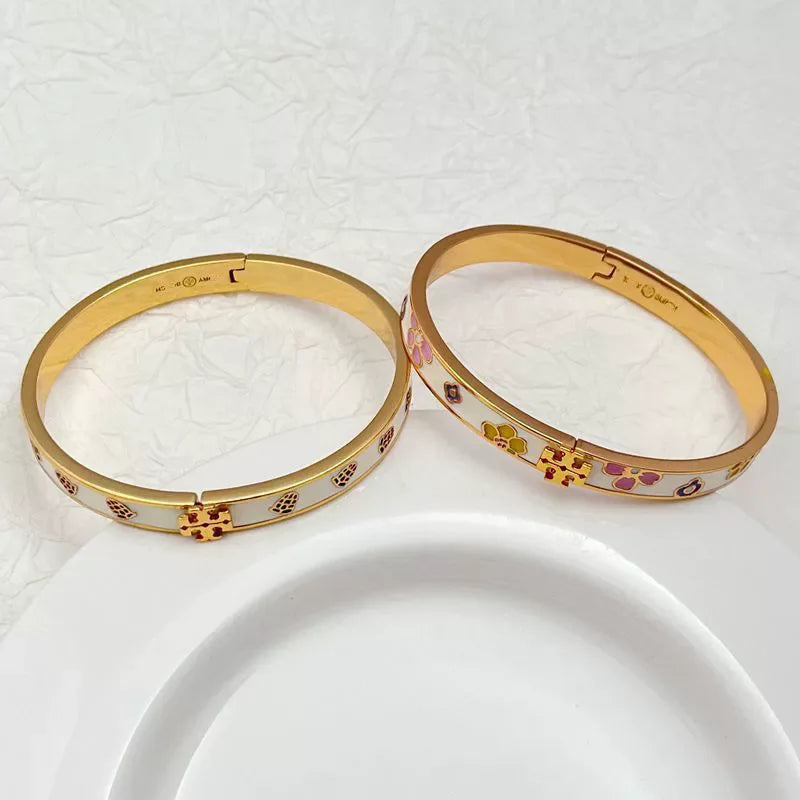 Tory Burch White Enamel Floral Hinged Bangle with Gold-Tone Accents Tory Burch Kira Flora-Print Enamel Bracelet | Neiman Marcus main image 3