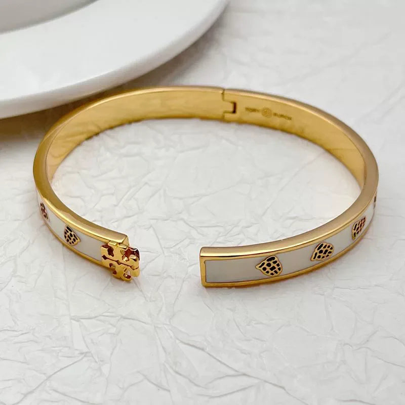 Tory Burch White Enamel Floral Hinged Bangle with Gold-Tone Accents Tory Burch Kira Flora-Print Enamel Bracelet | Neiman Marcus main image 4