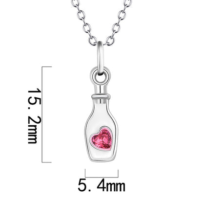 silver heart in bottle jewelry
