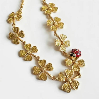 Oscar de la Renta Ladybug Crystal Four-Leaf Clover Necklace | Genuine Gold Plating | Hand-Painted Enamel