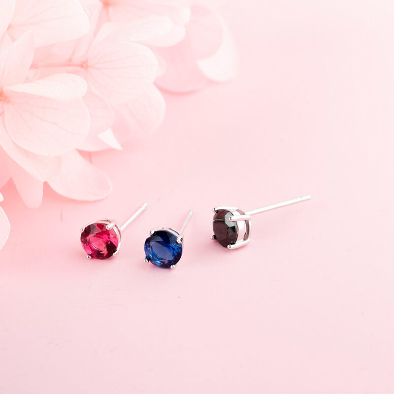 sterling silver 4 prong color diamond  stud earrings