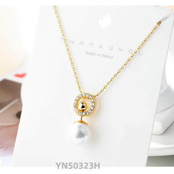 diamond circle with pearl pendant