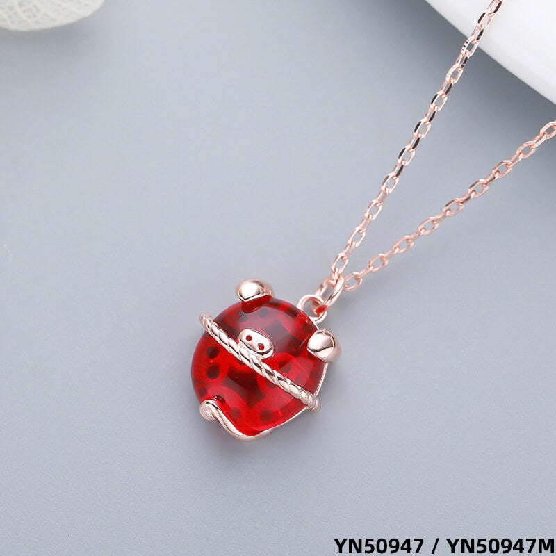 red pig necklace