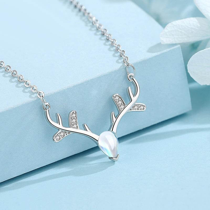 crystal zircon antler necklace silver