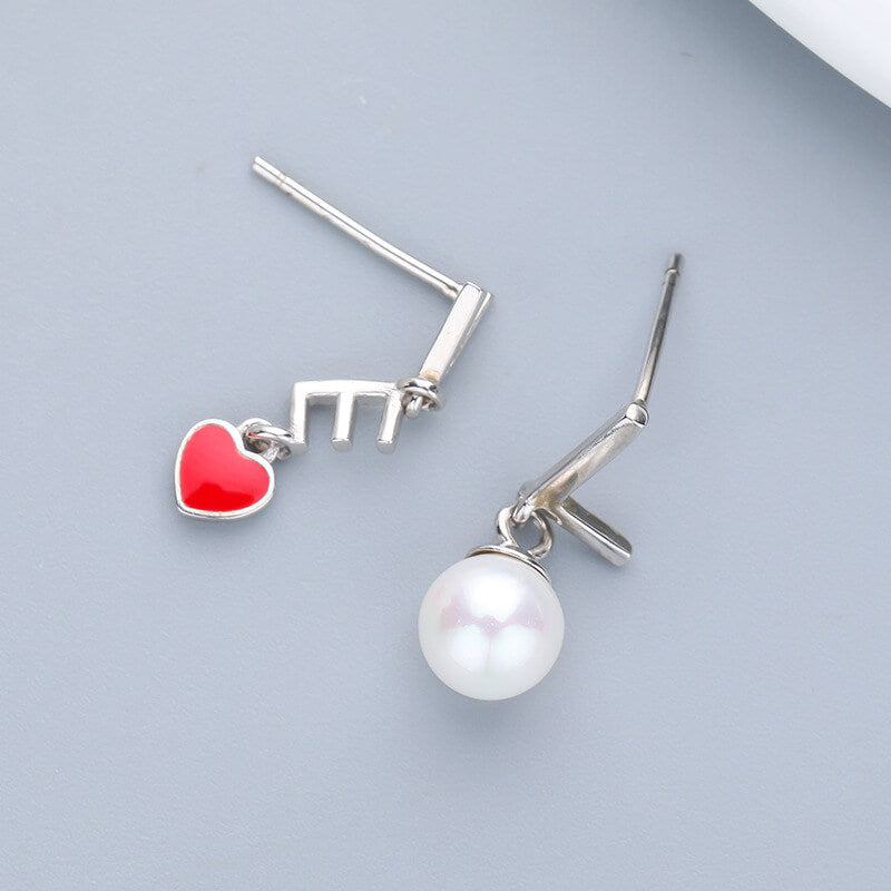 sterling silver pearl and heart stud