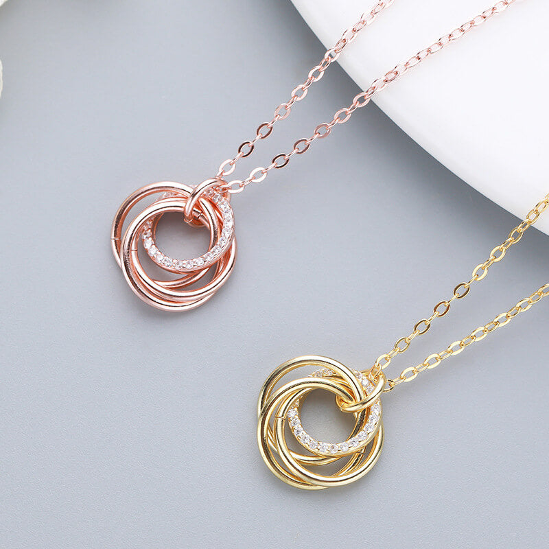 triple linked ring pendant silver