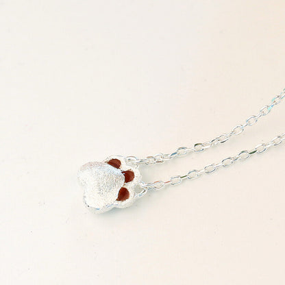 silver paw pendant