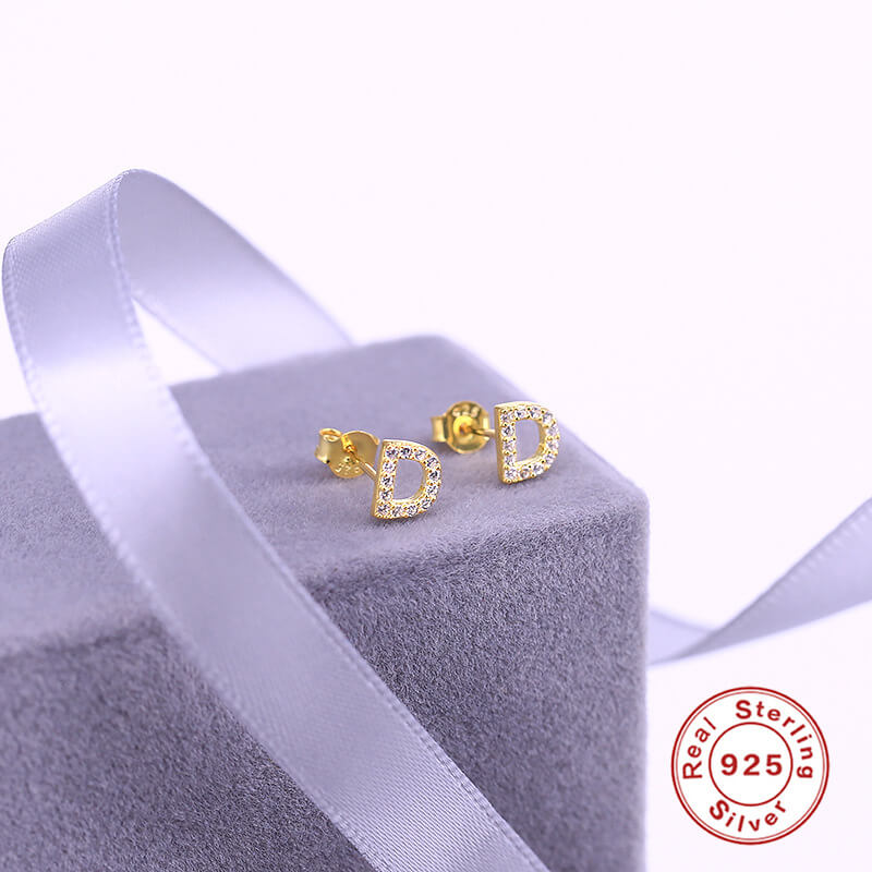 Gold D earring