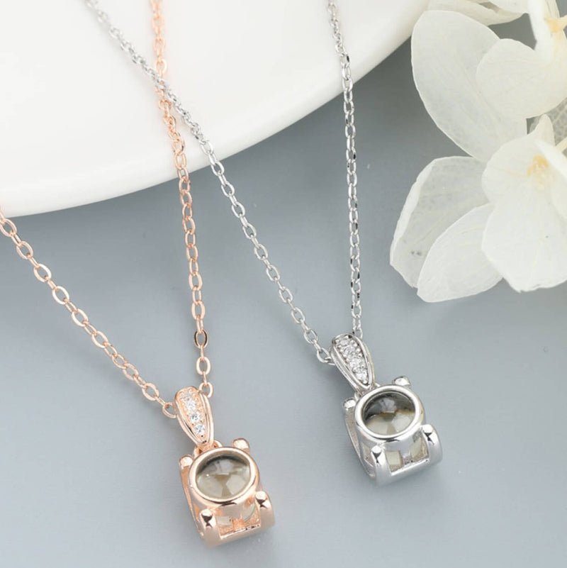 silver necklace with 925 on it