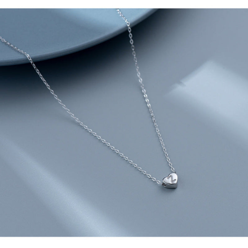 Tiny initial necklaces for girls