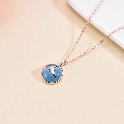 crystal with silver tail necklace