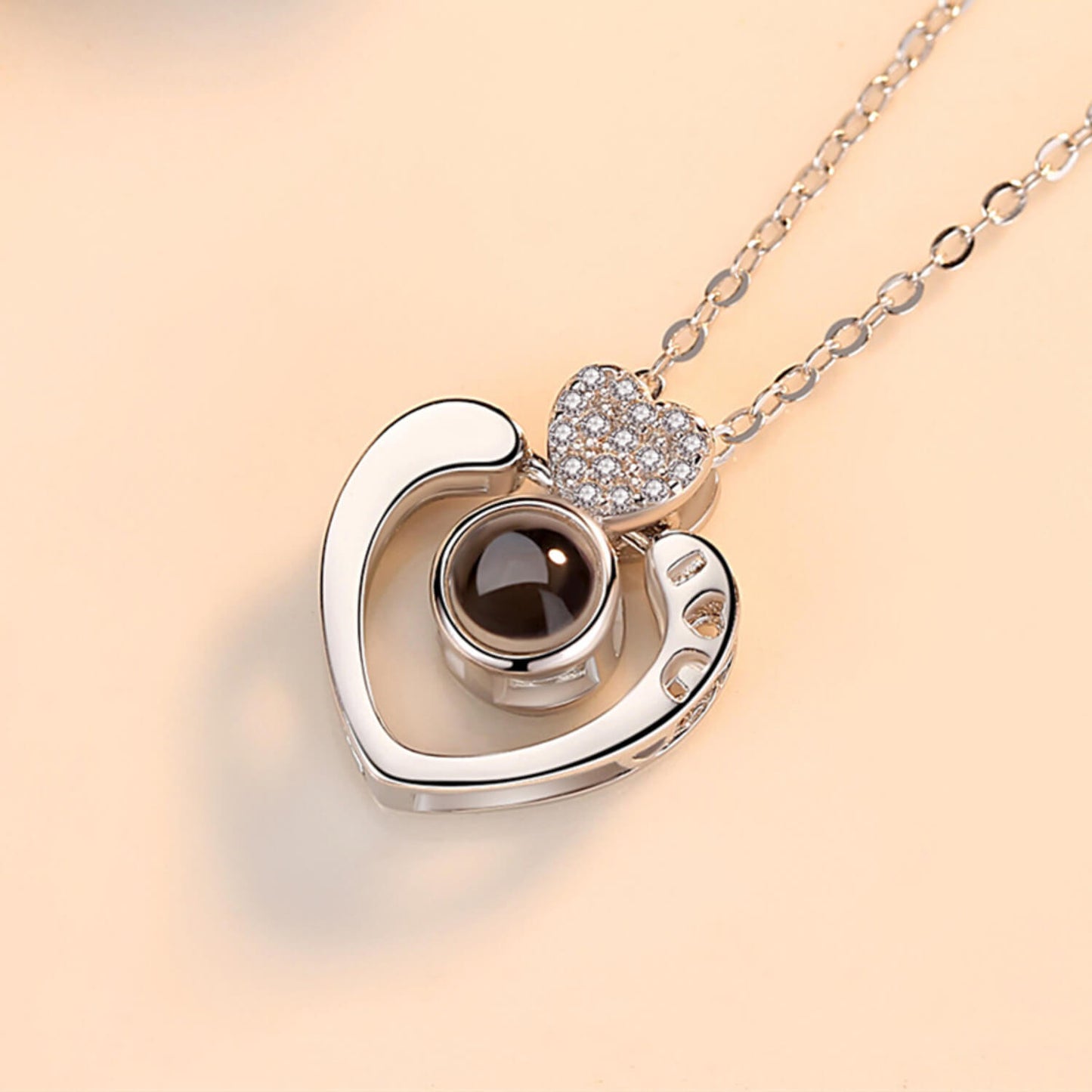 silver heart projection necklace