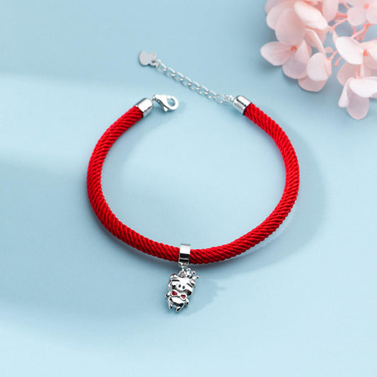 a red string bracelet