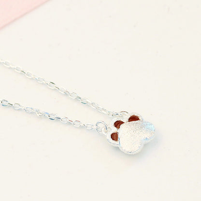 silver paw necklace