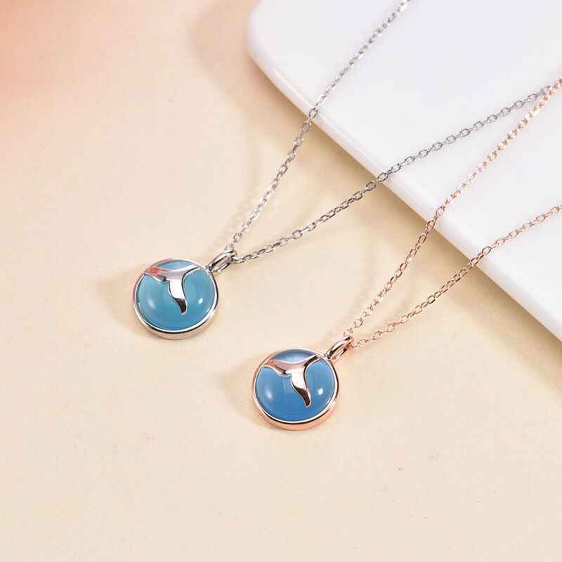 crystal with silver tail necklace