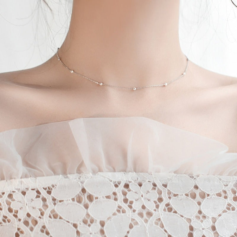 pearl necklace with charm