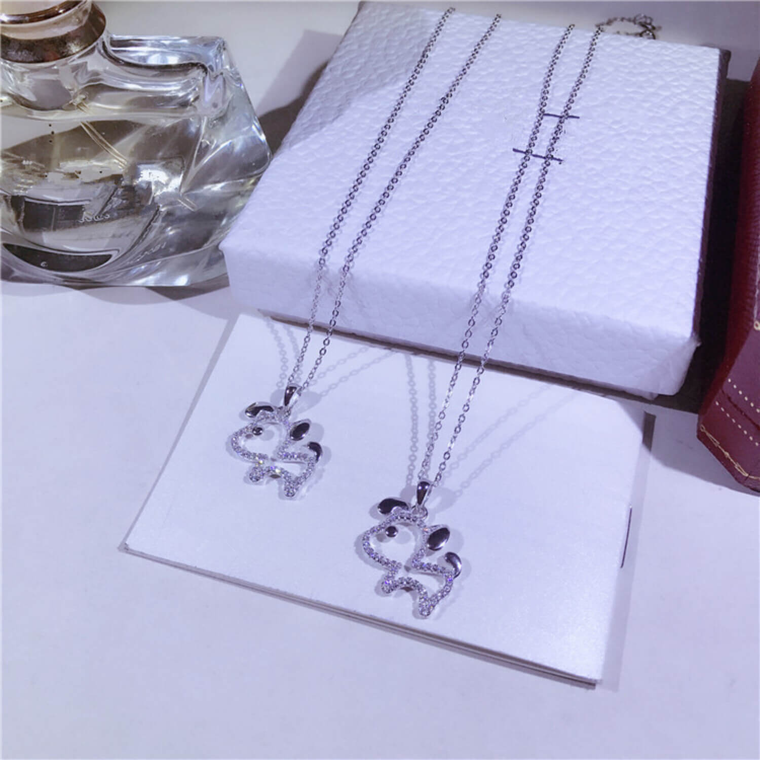 silver and diamond dog pendant